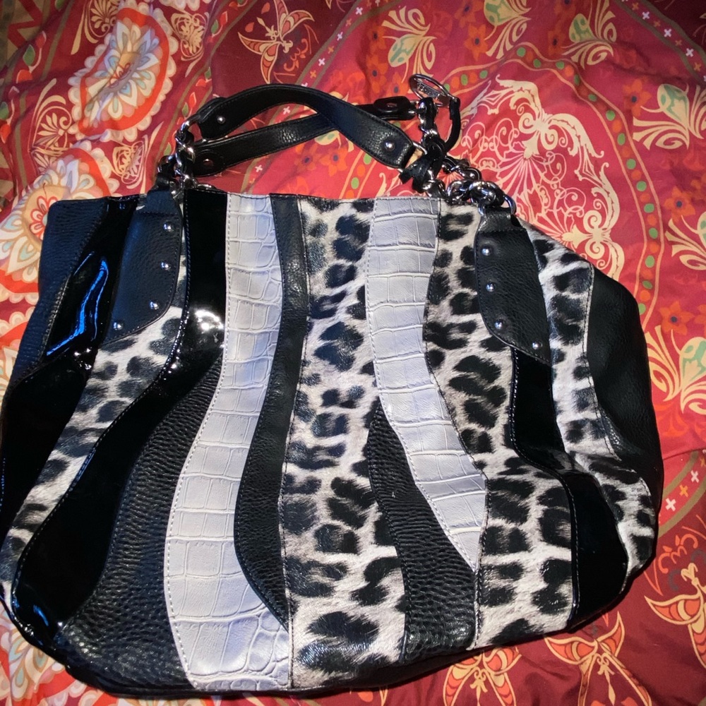 Carlos Santana shoulder bag
